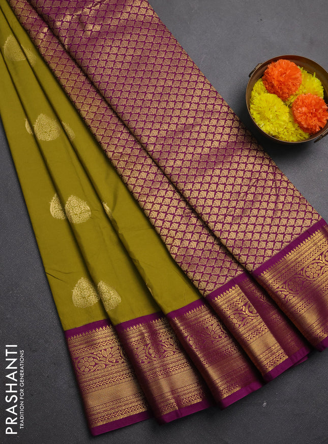 Semi kanchipuram silk saree mehendi green and wine shade with zari woven buttas and rich zari woven korvai border
