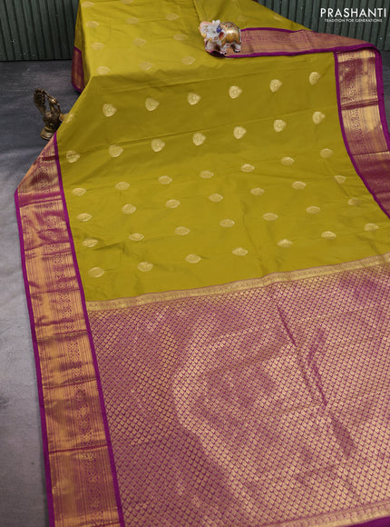 Semi kanchipuram silk saree mehendi green and wine shade with zari woven buttas and rich zari woven korvai border