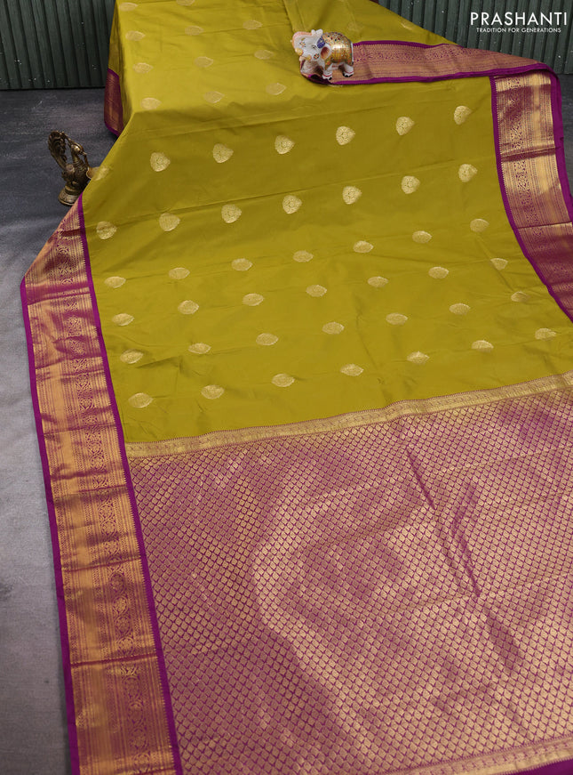 Semi kanchipuram silk saree mehendi green and wine shade with zari woven buttas and rich zari woven korvai border