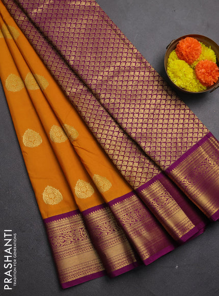Semi kanchipuram silk saree dark mustard and wine shade with zari woven buttas and rich zari woven korvai border