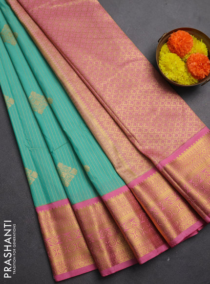 Semi kanchipuram silk saree teal green and light pink with allover zari stripes & buttas and zari woven korvai border