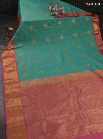 Semi kanchipuram silk saree teal green and light pink with allover zari stripes & buttas and zari woven korvai border