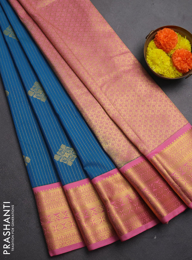 Semi kanchipuram silk saree peacock blue and light pink with allover zari stripes & buttas and zari woven korvai border