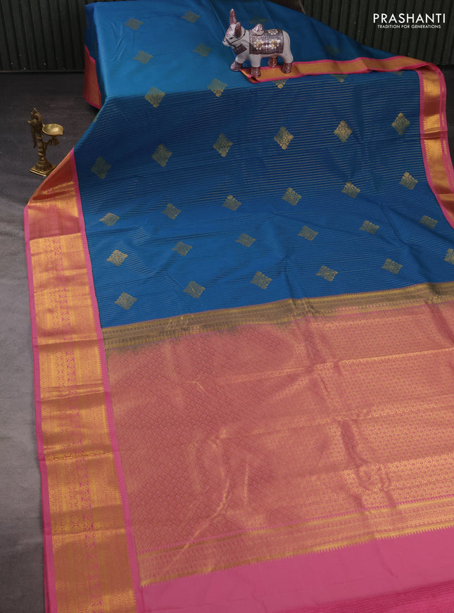 Semi kanchipuram silk saree peacock blue and light pink with allover zari stripes & buttas and zari woven korvai border