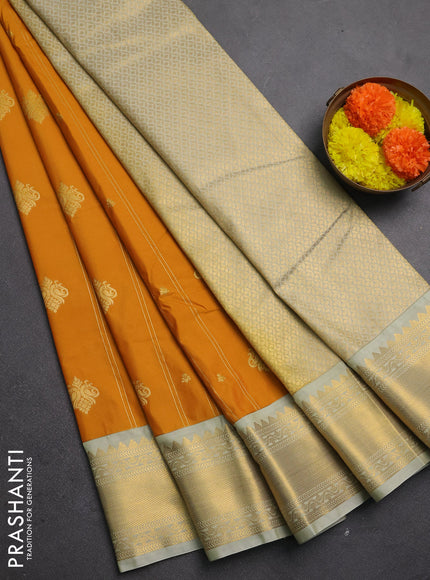 Semi kanchipuram silk saree mustard yellow and mild pista green with allover zari stripes & buttas and zari woven korvai border