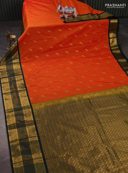 Semi kanchipuram silk saree orange and bottle green with allover zari woven buttas and long zari woven korvai border