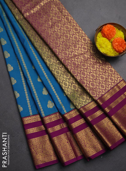 Semi kanchipuram silk saree peacock blue and wine shade with allover zari weaves & buttas and long zari woven korvai border
