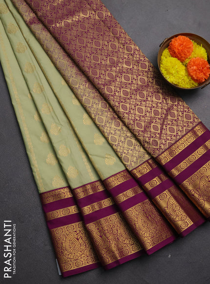 Semi kanchipuram silk saree mild pista green and wine shade with allover zari weaves & buttas and long zari woven korvai border
