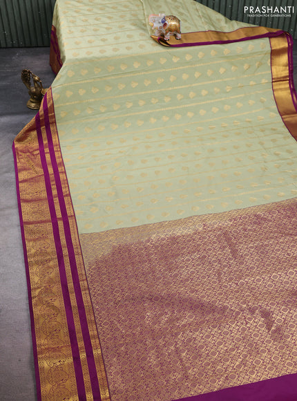 Semi kanchipuram silk saree mild pista green and wine shade with allover zari weaves & buttas and long zari woven korvai border