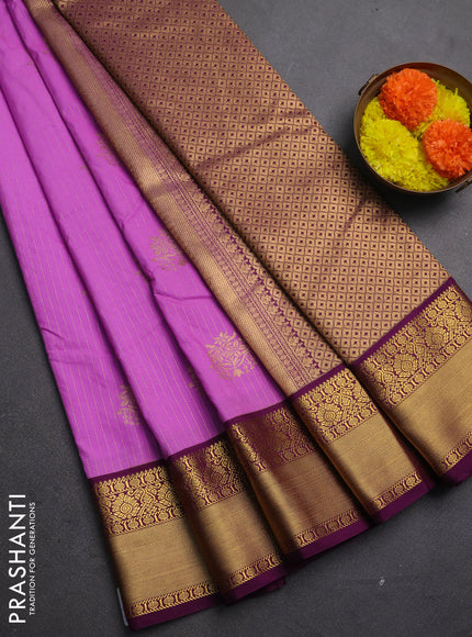 Semi kanchipuram silk saree lotus pink and wine shade with allover zari stripes & buttas and rich zari woven korvai border