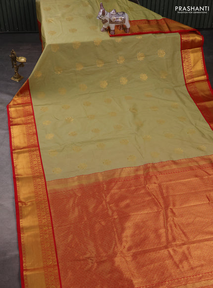 Semi kanchipuram silk saree mild pista green and red with allover zari stripes & buttas and rich zari woven korvai border