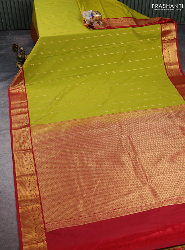 Semi kanchipuram silk saree lime green and red with allover zari woven buttas and zari woven korvai border