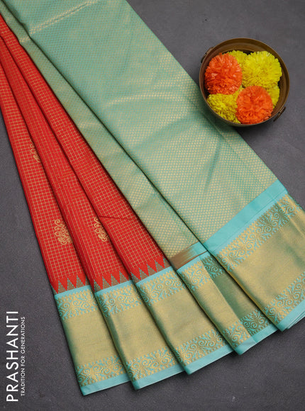 Semi kanchipuram silk saree orange and teal shade with allover small zari checks & buttas and temple design zari woven korvai border