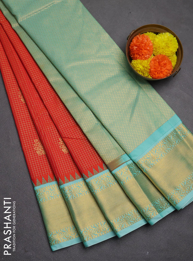 Semi kanchipuram silk saree orange and teal shade with allover small zari checks & buttas and temple design zari woven korvai border