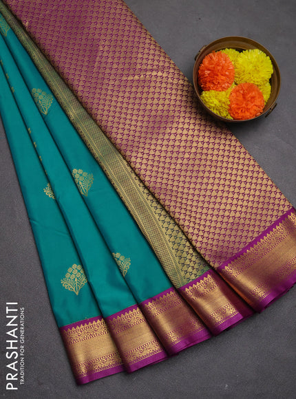 Semi kanchipuram silk saree teal green and purple with allover zari woven buttas and zari woven korvai border