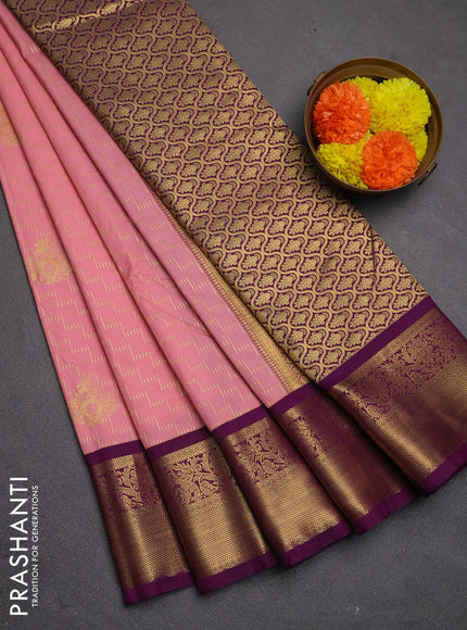 Semi kanchipuram silk saree peach pink and purple with allover zari weaves & buttas and zari woven korvai border