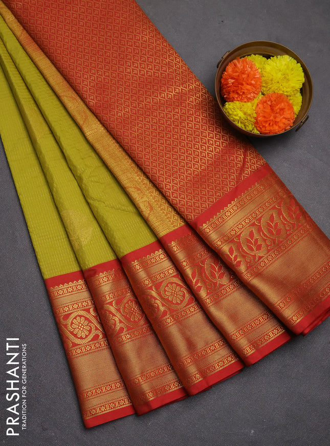 Semi kanchipuram silk saree lime green and red with allover zari weaves & buttas and long zari woven korvai border