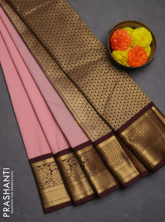 Semi kanchipuram silk saree pastel pink and deep maroon with paisley zari woven buttas and zari woven korvai border