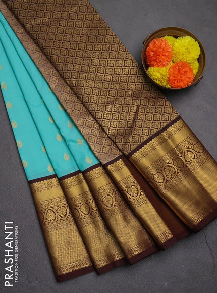Semi kanchipuram silk saree teal green and coffee brown with allover zari woven buttas and long zari woven korvai border