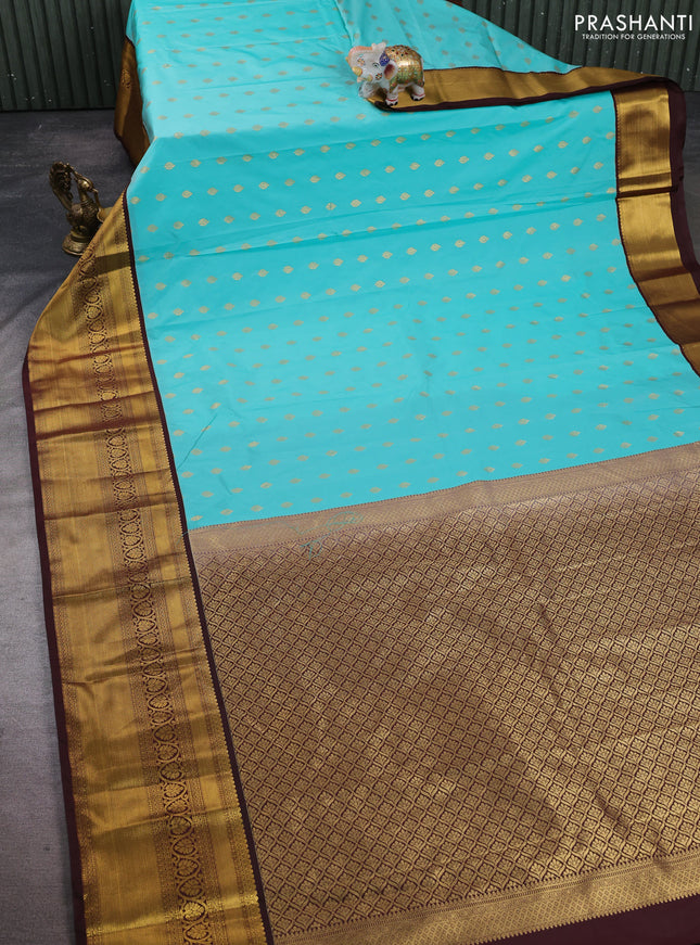 Semi kanchipuram silk saree teal green and coffee brown with allover zari woven buttas and long zari woven korvai border