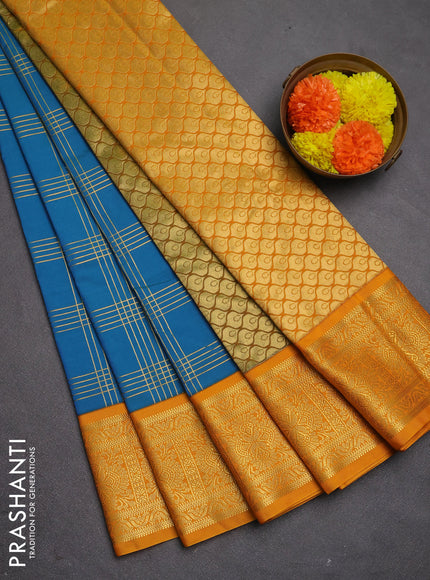 Semi kanchipuram silk saree peacock blue and mustard yellow with allover zari checks & buttas and zari woven korvai border