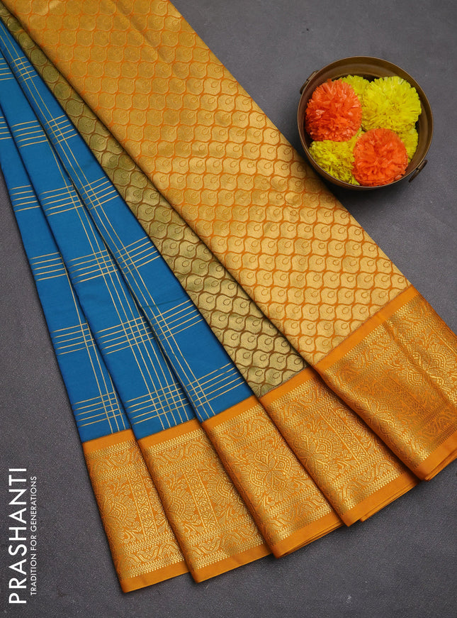 Semi kanchipuram silk saree peacock blue and mustard yellow with allover zari checks & buttas and zari woven korvai border