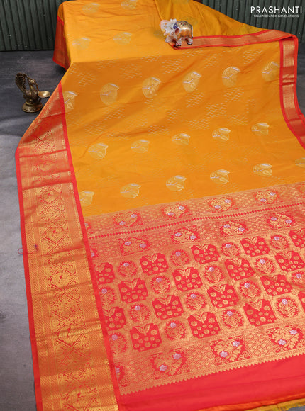 Semi kanchipuram silk saree dark mustard and orange with allover zari weaves & buttas and long zari woven korvai border