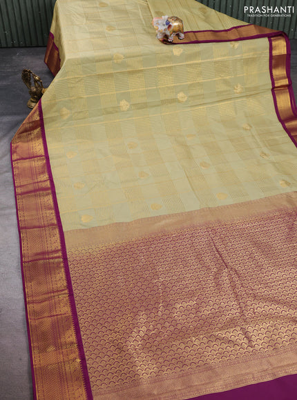 Semi kanchipuram silk saree mild pista green and magenta pink with allover zari checks & buttas and zari woven border