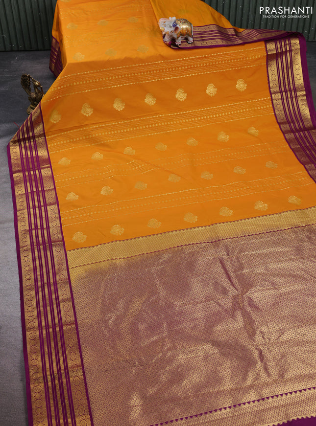 Semi kanchipuram silk saree mustard yellow and magenta pink with zari woven buttas and zari woven border