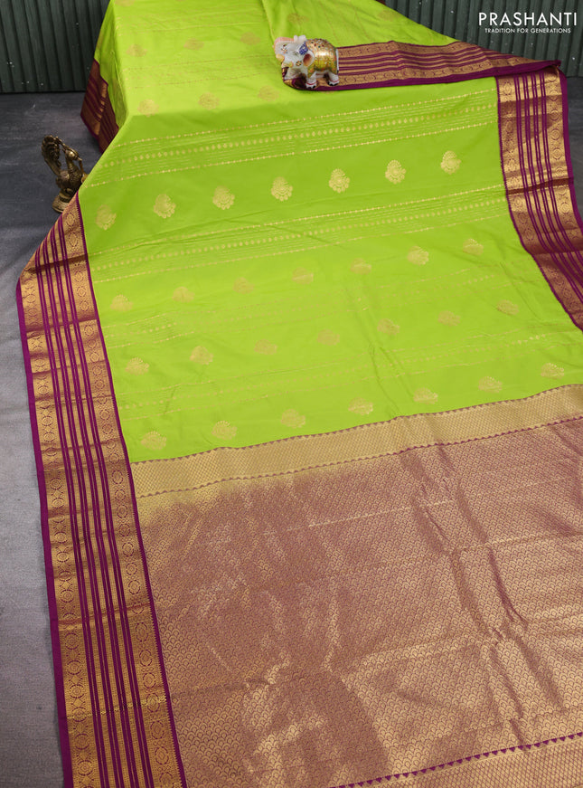 Semi kanchipuram silk saree light green and magenta pink with allover zari weaves & buttas and zari woven border
