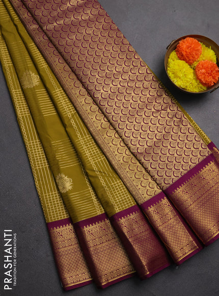 Semi kanchipuram silk saree mehendi green and magenta pink with allover zari checks & buttas and zari woven border