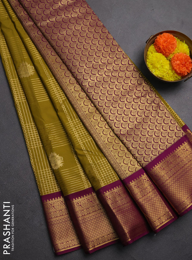 Semi kanchipuram silk saree mehendi green and magenta pink with allover zari checks & buttas and zari woven border