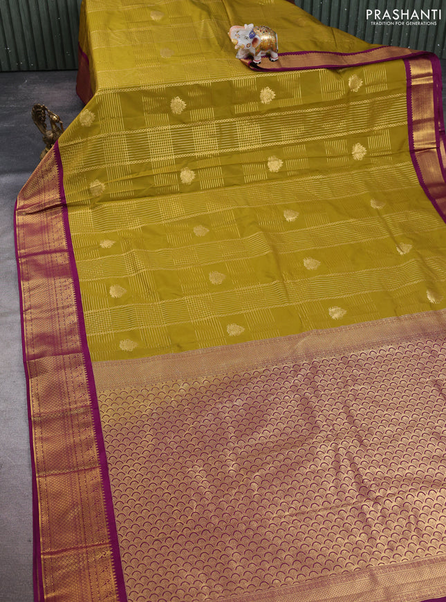 Semi kanchipuram silk saree mehendi green and magenta pink with allover zari checks & buttas and zari woven border