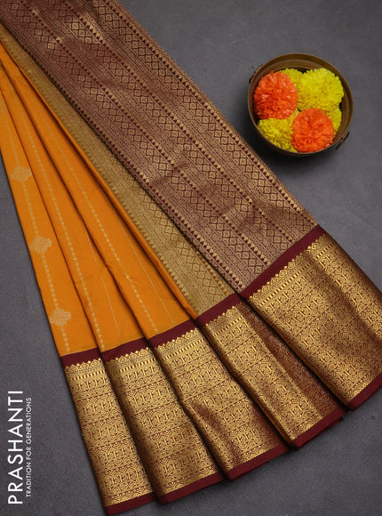 Semi kanchipuram silk saree mustard yellow and maroon with allover zari weaves and zari woven korvai border