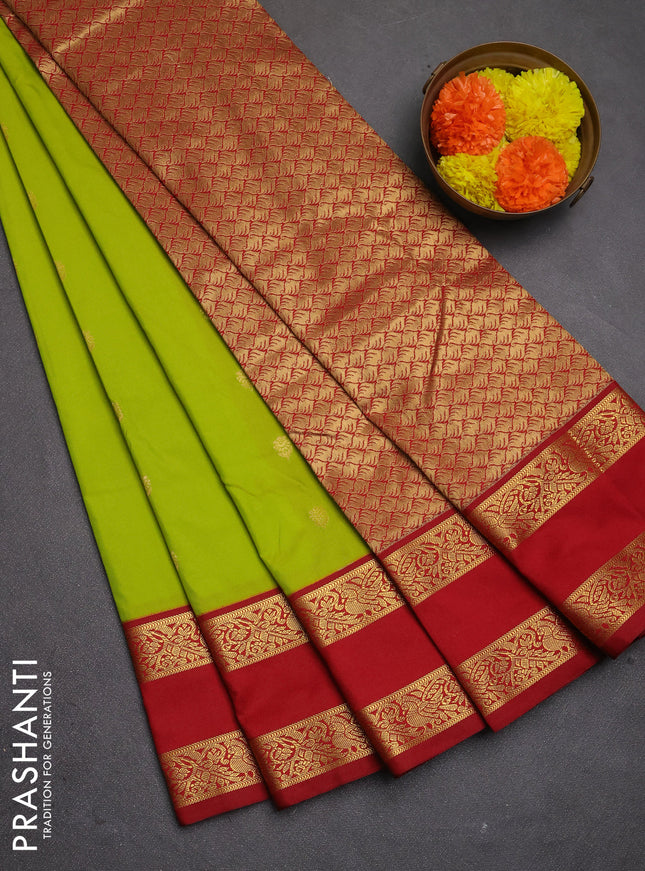 Semi kanchipuram silk saree light green and maroon with allover zari woven buttas and rettapet zari woven korvai border