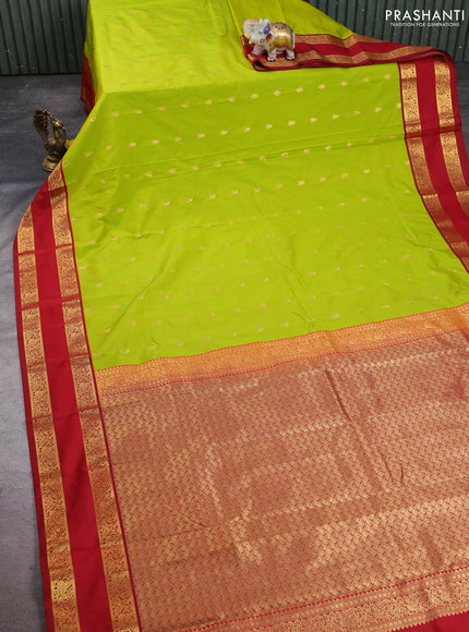 Semi kanchipuram silk saree light green and maroon with allover zari woven buttas and rettapet zari woven korvai border