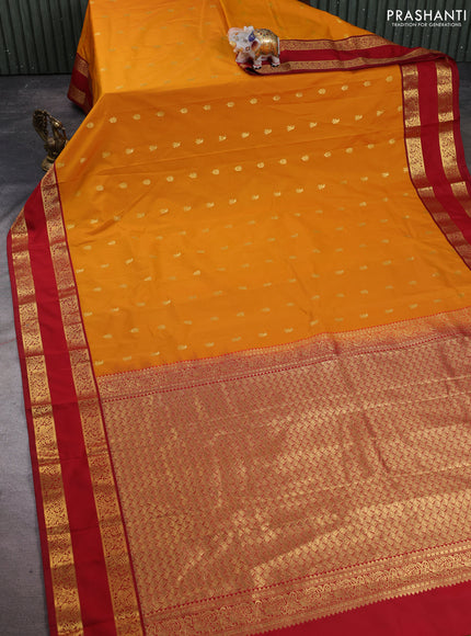 Semi kanchipuram silk saree sunset orange and maroon with allover zari woven buttas and rettapet zari woven korvai border