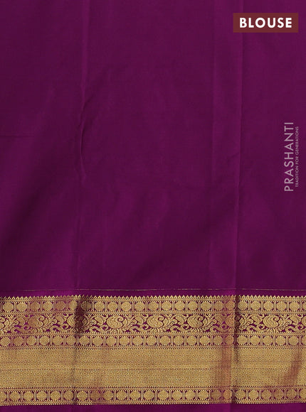 Semi kanchipuram silk saree mild pista green and purple with allover zari checks & buttas and zari woven korvai border