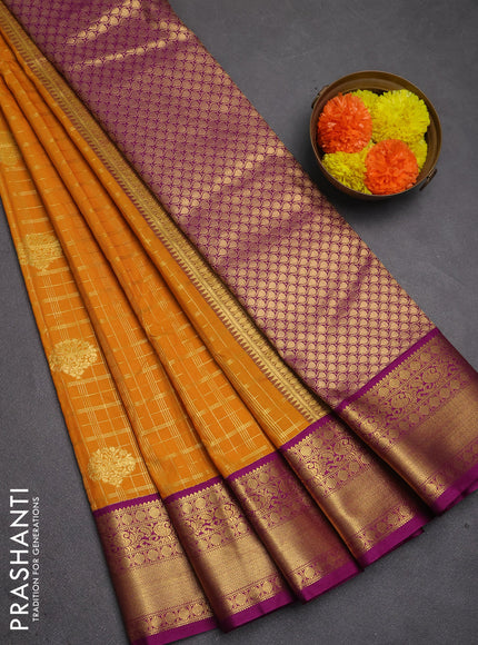 Semi kanchipuram silk saree dark mustard and purple with allover zari checks & buttas and zari woven korvai border