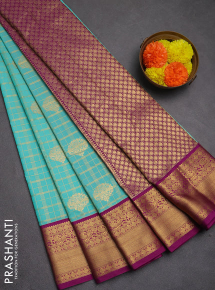 Semi kanchipuram silk saree teal green and purple with allover zari checks & buttas and zari woven korvai border