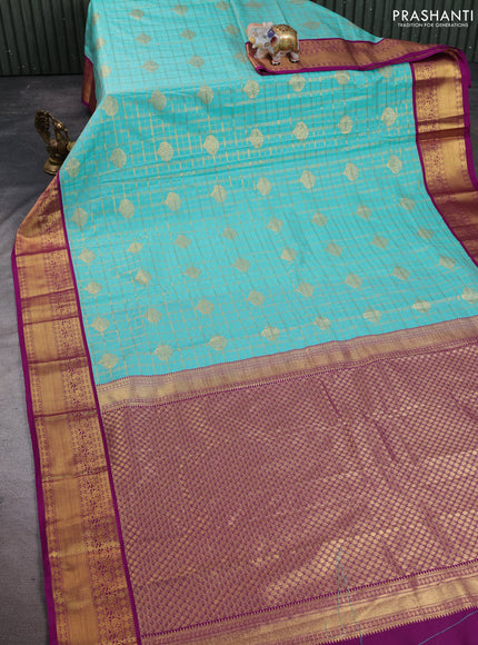 Semi kanchipuram silk saree teal green and purple with allover zari checks & buttas and zari woven korvai border