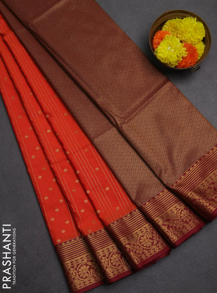 Semi soft silk saree orange and maroon with allover zari weaves and zari woven border
