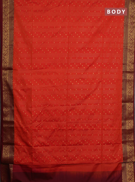 Semi soft silk saree orange and maroon with allover zari weaves and zari woven border