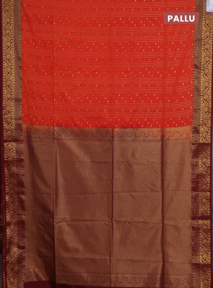Semi soft silk saree orange and maroon with allover zari weaves and zari woven border