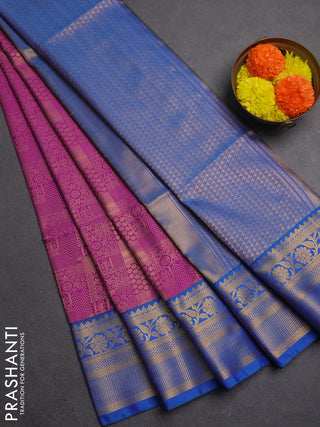 Semi soft silk saree purple and blue with allover zari weaves and zari woven border