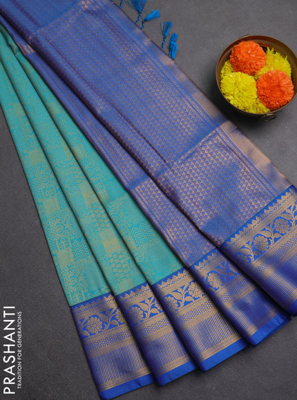 Semi soft silk saree teal green and blue with allover zari weaves and zari woven border