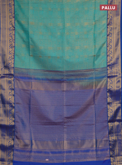 Semi soft silk saree teal green and blue with allover zari weaves and zari woven border