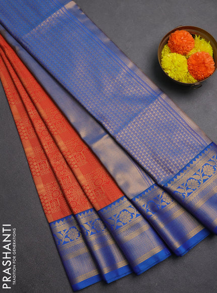 Semi soft silk saree rust shade and blue with allover zari weaves and zari woven border