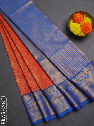 Semi soft silk saree rust shade and blue with allover zari weaves and zari woven border