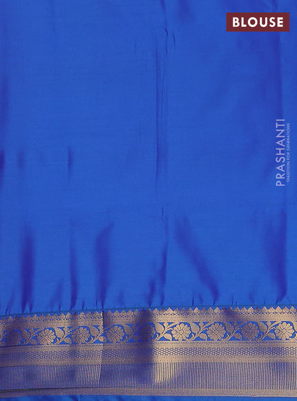 Semi soft silk saree rust shade and blue with allover zari weaves and zari woven border
